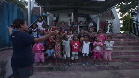 A-group-of-native-Papuan-children-having-fun-singing-at-the-Indonesian-border-church-in-Papua-New-Guinea