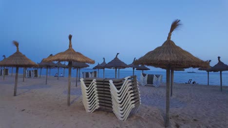 Can-Pastilla-beach-after-sunset,-quiet-relaxing-Mediterranean-sea-waves,-Spain