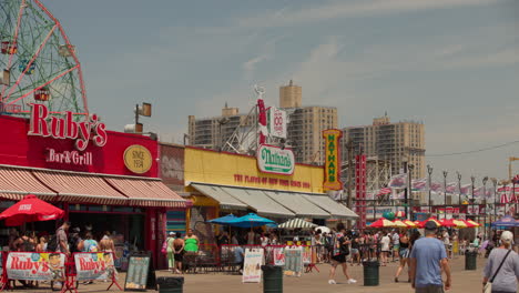 People-waiting-in-line-at-Nathan's-hot-dog-restaurant-in-Coney-Island-New-York-USA