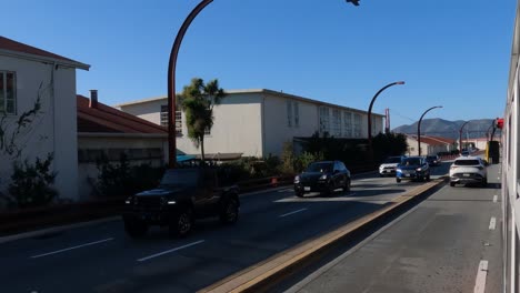 San-Francisco-USA,-Traffic-on-Richardson-Avenue-in-Front-of-Golden-Gate-Bridge,-Bus-Passenger-Through-WIndow-POV-60fps