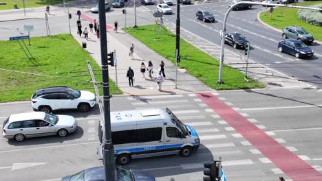 Police-drive-through-a-jammed-roundabout-in-Lublin