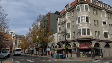 Downtown-Berkeley-Street-Traffic,-Buildings-and-Shops,-California-USA