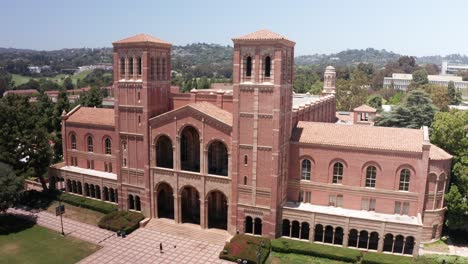 Low-panning-aerial-shot-of-Royce-Hall-on-the-UCLA-campus-in-Westwood-Village,-California