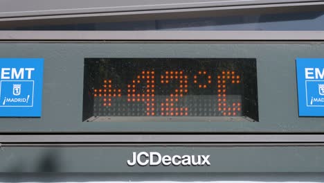 An-unofficial-digital-screen-thermometer-displays-a-temperature-of-up-to-42-degrees-Celsius-in-Madrid,-Spain