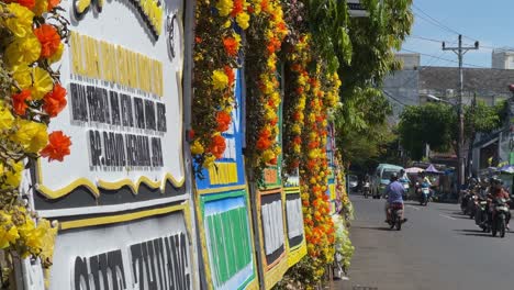 Various-sympathy-and-condolence-wreath-on-the-roadside-of-Indonesia