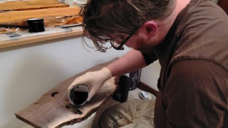 Pouring-Epoxy-Resin-on-Wood---a-Carpenter-makes-a-Fine-Furniture-River-Table-with-Black-Fiberglass