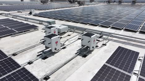 Solar-panels-and-electrical-equipment-on-a-rooftop