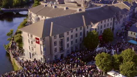 Vibrant-Galway-Arts-Festival-scene,-bustling-with-parade-spectators