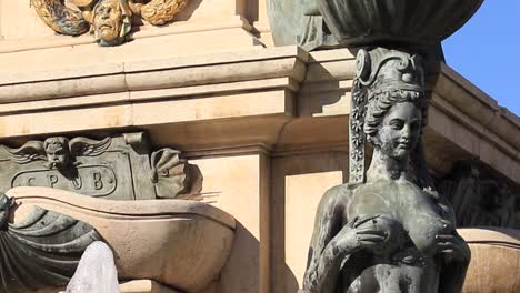 View-of-the-Fountain-of-Neptune-in-Bologna,-Emilia-Romagna,-created-by-Flemish-sculptor-Giambologna-and-designed-by-Tommaso-Laureti,-with-the-Old-Town-of-Batumi,-Georgia