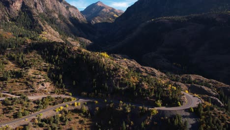 Aerial-View-of-Mountain-Pass-Above-Ouray,-Colorado-USA-on-Sunny-Autumn-Day,-US-550-Route