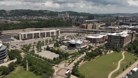 Drone-hyper-lapse-video-of-Pittsburgh,-Pennsylvania-skyline-to-Acrisure-Stadium,-home-of-the-Pittsburgh-Steelers