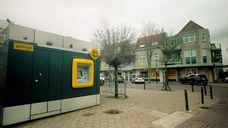 Cash-machine-at-a-small-Maarheeze-shopping-mall-with-Jumbo-supermarket-in-Brabant-village