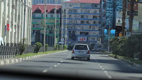 Driving-along-the-streets-of-Batumi,-Georgia,-during-the-daytime,-capturing-the-concept-of-urban-exploration-and-everyday-city-life