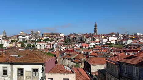 Panning-view-shot-of-scenic-cityscape-view,-the-sea-of-red-roofs-in-Porto,-Portugal