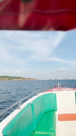 Boat-is-a-driving-scene-on-the-beautiful-bright-turquoise-sea-to-the-island-with-beautiful-scenery