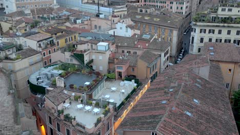 Historic-neighborhood-in-central-Rome,-Italy---ascending-aerial-reveal