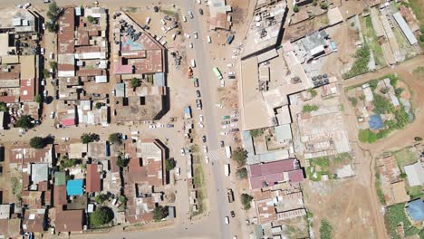 Busy-streets-of-African-town-Loitokitok,-Kenya,-aerial-top-down