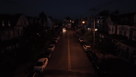 Aerial-night-view-of-a-residential-street-in-a-U