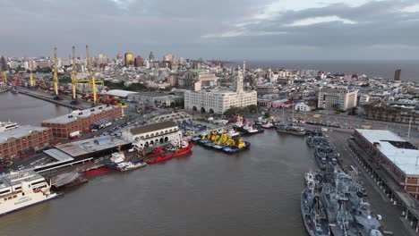 Drone-Shot-of-Montevideo-City-Harbor-and-Cityscape,-Ships-and-Buildings,-Uruguay-60fps