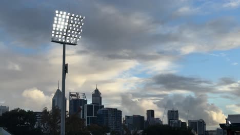 Night-lights-at-HBF-Park,-with-Perth,-skyline-Western-Australia