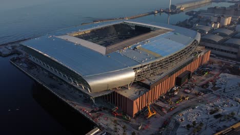 Bramley-Moore-football-stadium-aerial-view-orbiting-new-Everton-construction-site-on-Mersey-river