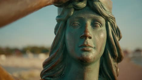 Statue-of-siren-looking-at-the-sea-located-in-Ustka-in-Poland