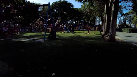 People-spending-leisure-time-in-the-park-at-the-downtown-city-square-wearing-masks-during-the-pandemic