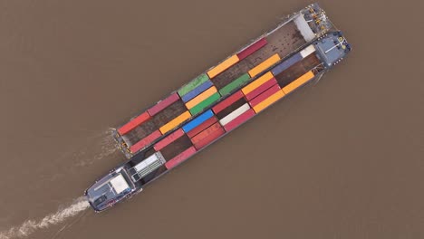 H2-Barge-Sailing-In-Dordrecht,-Netherlands---Aerial-Top-Down