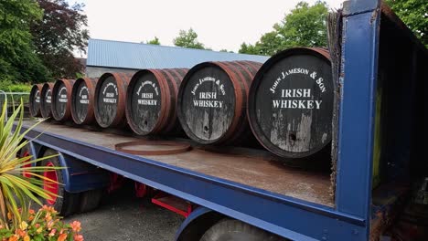 Old-truck-and-barrels-inside-the-Jameson-Midleton-Distillery-in-Cork,-Ireland