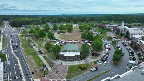 Aerial-approaching-shot-of-Event-in-Suwanee-City-during-summer-day