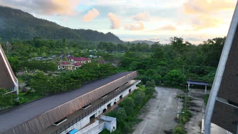 Museum-and-church-buildings-at-dusk-in-the-afternoon-at-the-Indonesian-Papua-New-Guinea-border,-Skouw-Jayapura