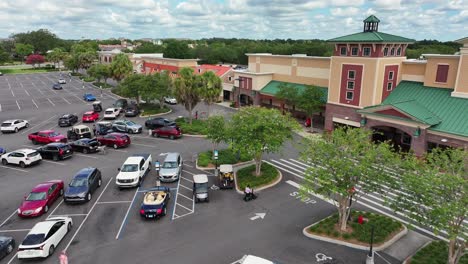 Publix-Food-and-Pharmacy-in-The-Villages-City-with-parking-cars-and-golf-carts-in-Florida