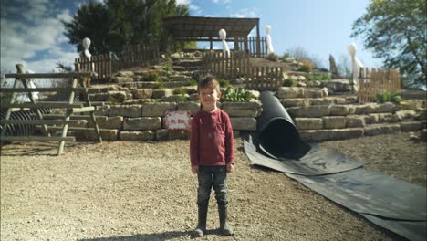 Happy-little-boy-smiling-at-halloween-pumpkin-patch