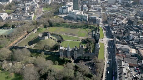 City-centre-of-Cardiff,-Wales-with-Victorian-Gothic-fantasy-Castle,-aerial-view