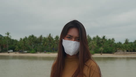 Portrait-of-asian-girl-wearing-protective-mask-with-during-Corona-Virus-pandemic