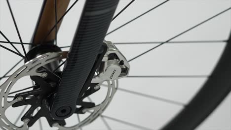 detail-of-modern-road-bicycle,-rfront-wheel-of-road-racing-bicycle,-tire