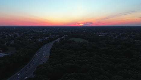 An-aerial-view-of-a-Long-Island-residential-neighborhood-during-a-colorful-sunrise