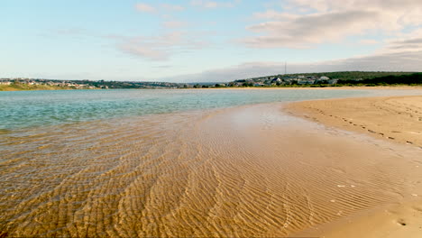 Clear-estuary-water-and-abstract-sand-patterns-of-Goukou-river-in-Still-Bay