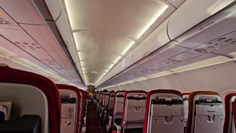 Many-people-are-seen-sitting-on-different-seats-in-the-plane