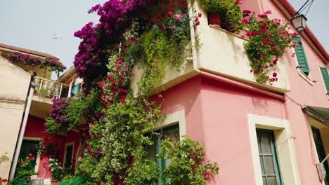 Walking-through-the-narrow-streets-of-Lakones-mountain-village-in-Corfu,-Greece