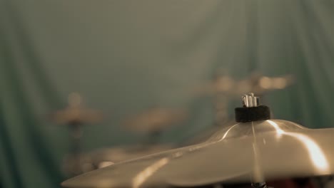 Slow-motion-close-up-of-a-drummer-striking-a-cymbal-once