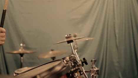 Slow-motion-footage-captures-a-drummer's-hand-hitting-a-cymbal