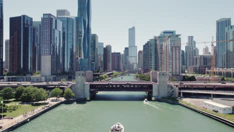 Aerial-Chicago-downtown-skyline-building-and-drone-view-along-skyscrapers-at-sunny-day