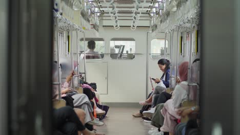 People-Commuting-At-The-Train-From-Rawa-Buntu-Station-In-Serpong,-South-Tangerang,-Indonesia