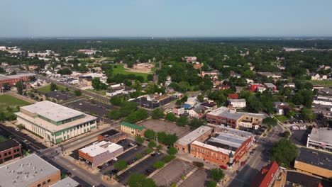 Birds-Eye-View-Above-Area-surrounding-Downtown-Aurora,-Illinois-in-Summer