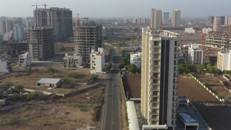 Drone-camera-showing-big-school-and-high-rise-buildings