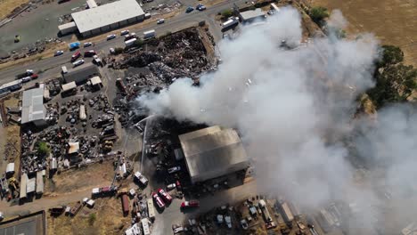 Industrial-Scrap-Metal-Fire-Aerial-Overhead-Pan