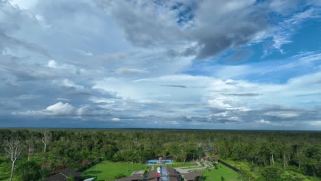 clouds-and-blue-sky-Entrance-gate-taken-by-drone-State-border-between-Indonesia-and-Papua-New-Guinea-in-Sota,-Merauke,-Papua,-Indonesia