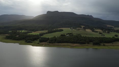 Aerial-view-of-the-rural-wooded-landscape-and-shores-of-Huntsman-Lake-in-Tasmania