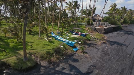 Indonesian-shoreline-scene,-traditional-boat-transportation,-vegetation